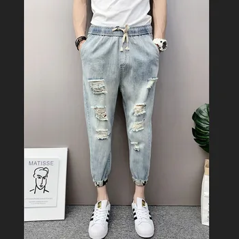 A primavera e o verão 2021 nova Moda cintura elástica Casual hip hop espírito cara de jeans rasgados coreano slim-encaixe do tornozelo comprimento de calças